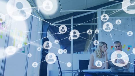 animation of network of connections over diverse business people using tablet in office