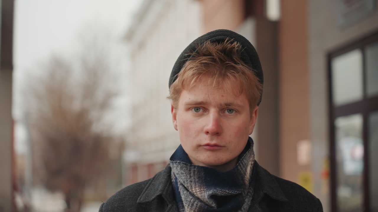 Expressive emotional portrait. Intimate image of creator displaying genuine tears and emotion. Closeup of individual revealing heartfelt feelings with touch and cold breath on glass