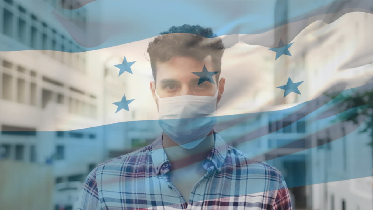 Animazione della bandiera dell'Honduras che sventola sopra un uomo con mascherina durante la pandemia di COVID-19.