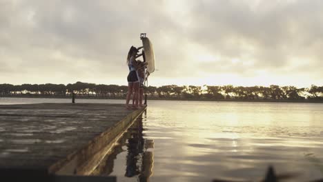 Female-rowing-team-training-on-a-river