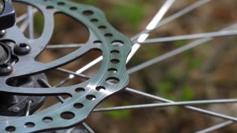 bicycle wheel brake disc and spokes rotating slow motion