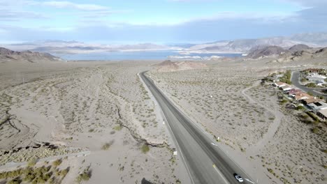 lake mead wide shot and highway 93 near boulder city, nevada and drone video moving down