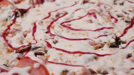 close-up of a spiral-shaped pizza