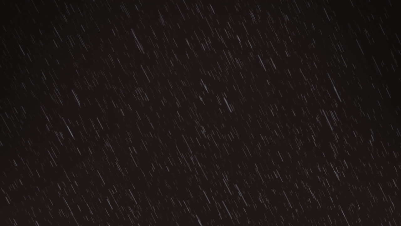 Animation of rain on black background