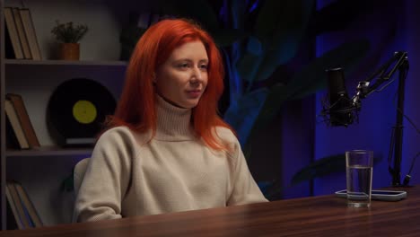 woman in podcast studio