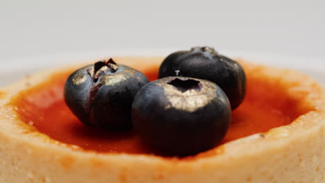 close-up of a miniature tart with blueberries