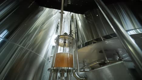 modern craft brewery. craft beer production. modern equipment in brewery, metal tanks, alcoholic drink production