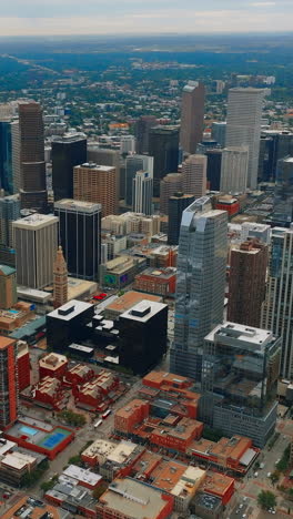 downtown urban cityscape buildings. aerial panorama of denver, colorado. vertical video