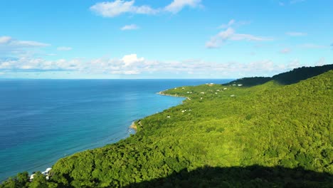 a private caribbean paradise comes to life near st. croix, usvi, where crystal waters meet a coastal forest holding just a few upscale vacation villas glowing in the midday sun