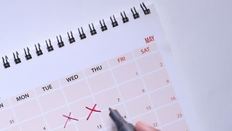 marking dates on a calendar