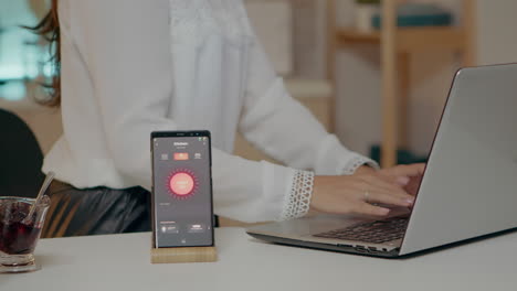 woman using voice assistant controlling light turning it on