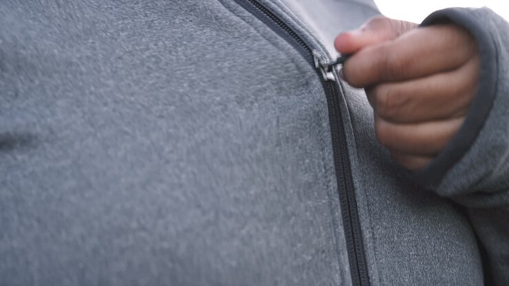 Fitness, exercise clothes and zip on jacket