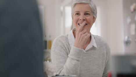 happy-mature-couple-eating-breakfast-together-wife-smiling-enjoying-conversation-with-husband-at-table-sharing-morning-meal-in-kitchen-day-in-the-life-4k-footage