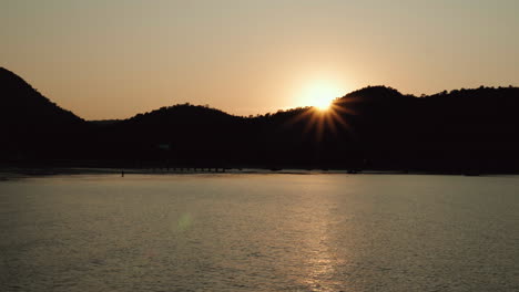 sunset backlight hill at pattaya beach ocean sea