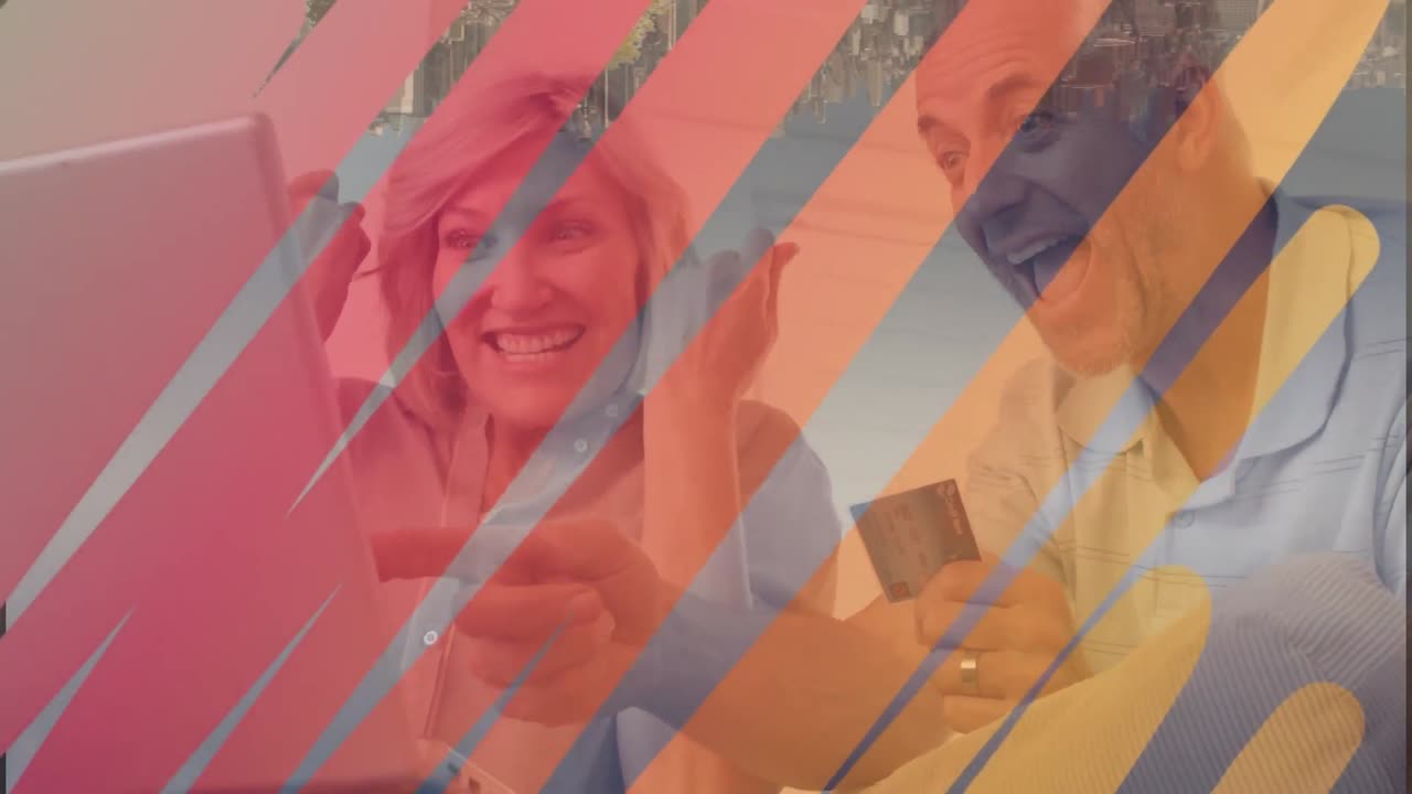 animación de formas sobre una pareja caucásica usando una computadora portátil