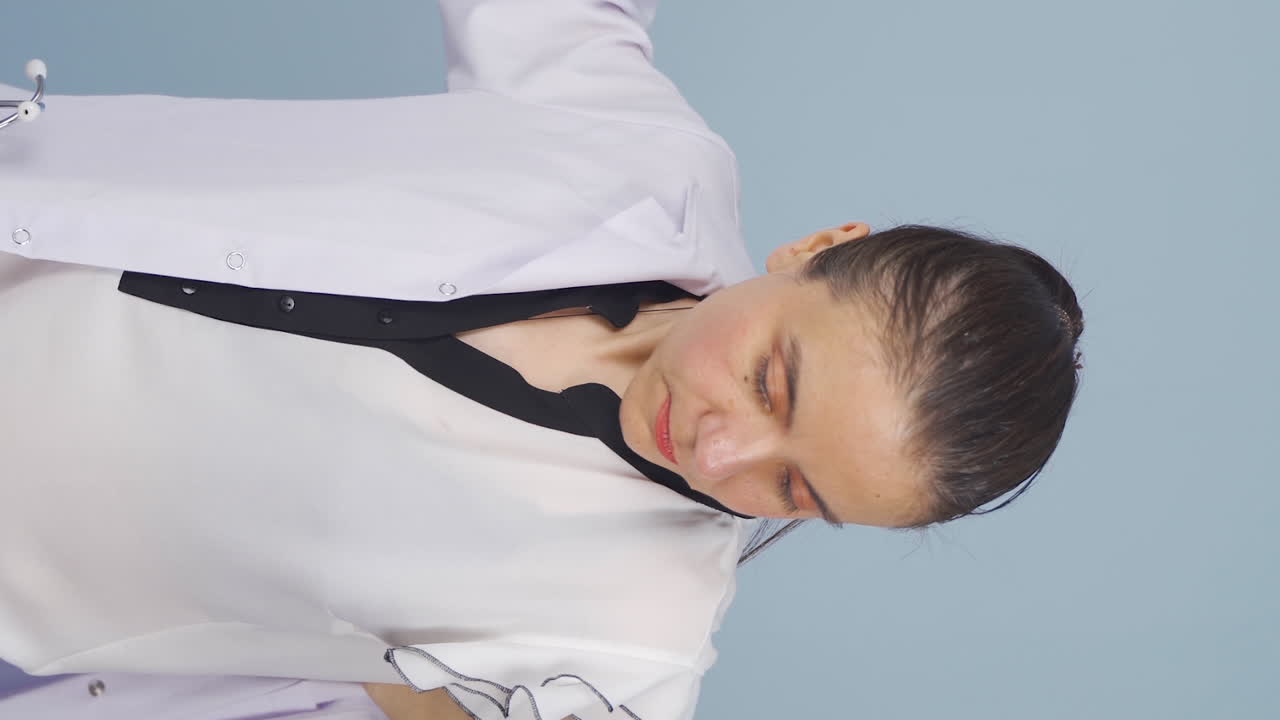 Vertical video of Doctor and doctor's coat.