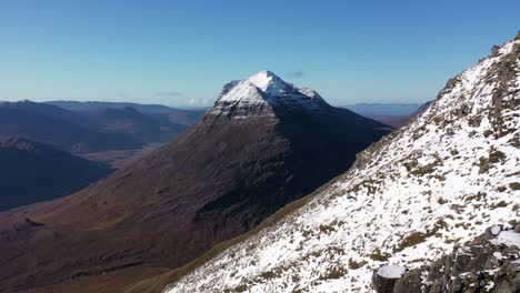 Liathach,-Torridon-mountains,-Scotland-in-winter,-aerial