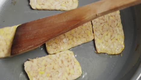 Traditional-Indonesian-Food-With-Fried-Tempeh-Made-With-Fermented-Soybeans