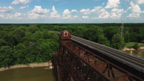 Old-Railway-And-Bridge-In-Twin-City-Riverfront-Park,-Arkansas,-USA---drone-shot