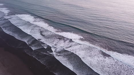 flying over blue ocean with scenic tropical waves in olon beach, ecuador