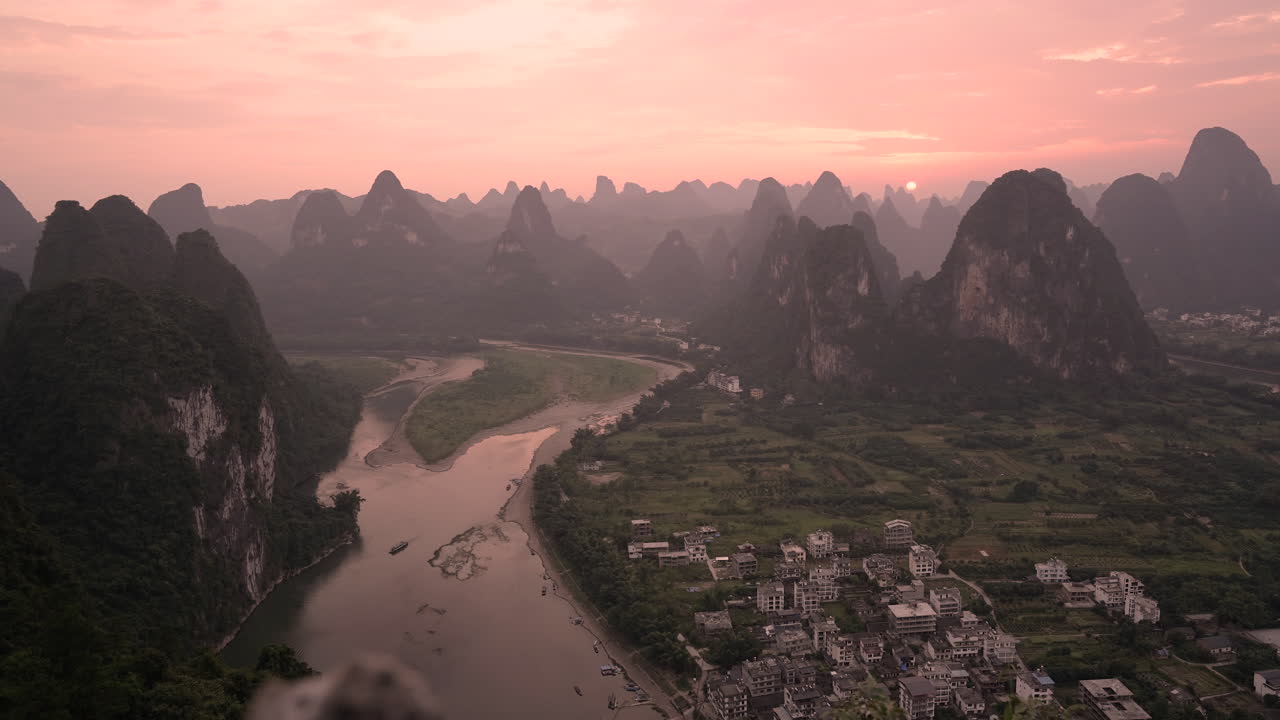 Li River And Karst Mountains With Pink Sunset In The Sky Near Yangshuo, Guilin, China