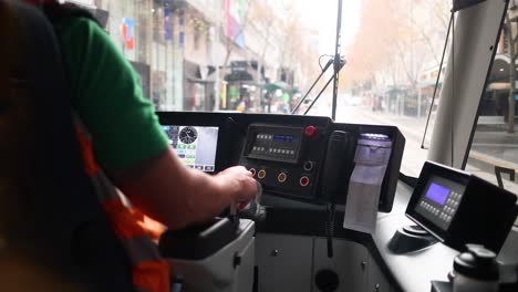 tram driver operating through melbourne city streets