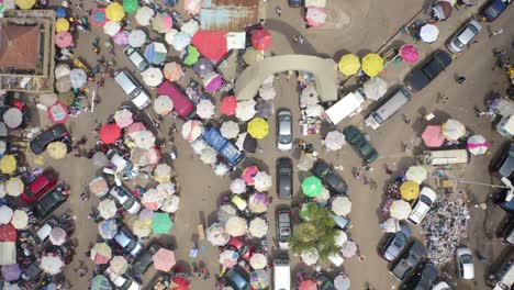 crowd of people and cars at accra central market _bird eye view