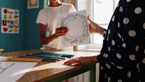children coloring activities with teacher