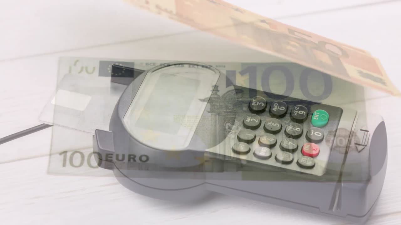 animación de billetes en euros que caen sobre el terminal de pago
