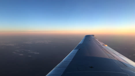 earth's horizon at golden hour, shot somewhere over the east coast of the usa