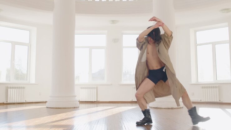 Contemporary Male Japanese Dancer Training Dance Moves In The Middle Of The Studio 1