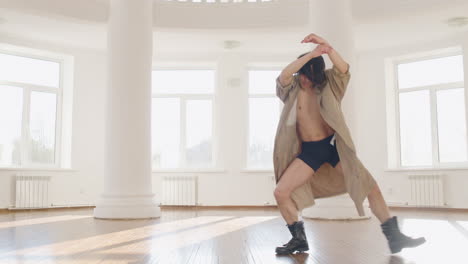 contemporary male japanese dancer training dance moves in the middle of the studio 1