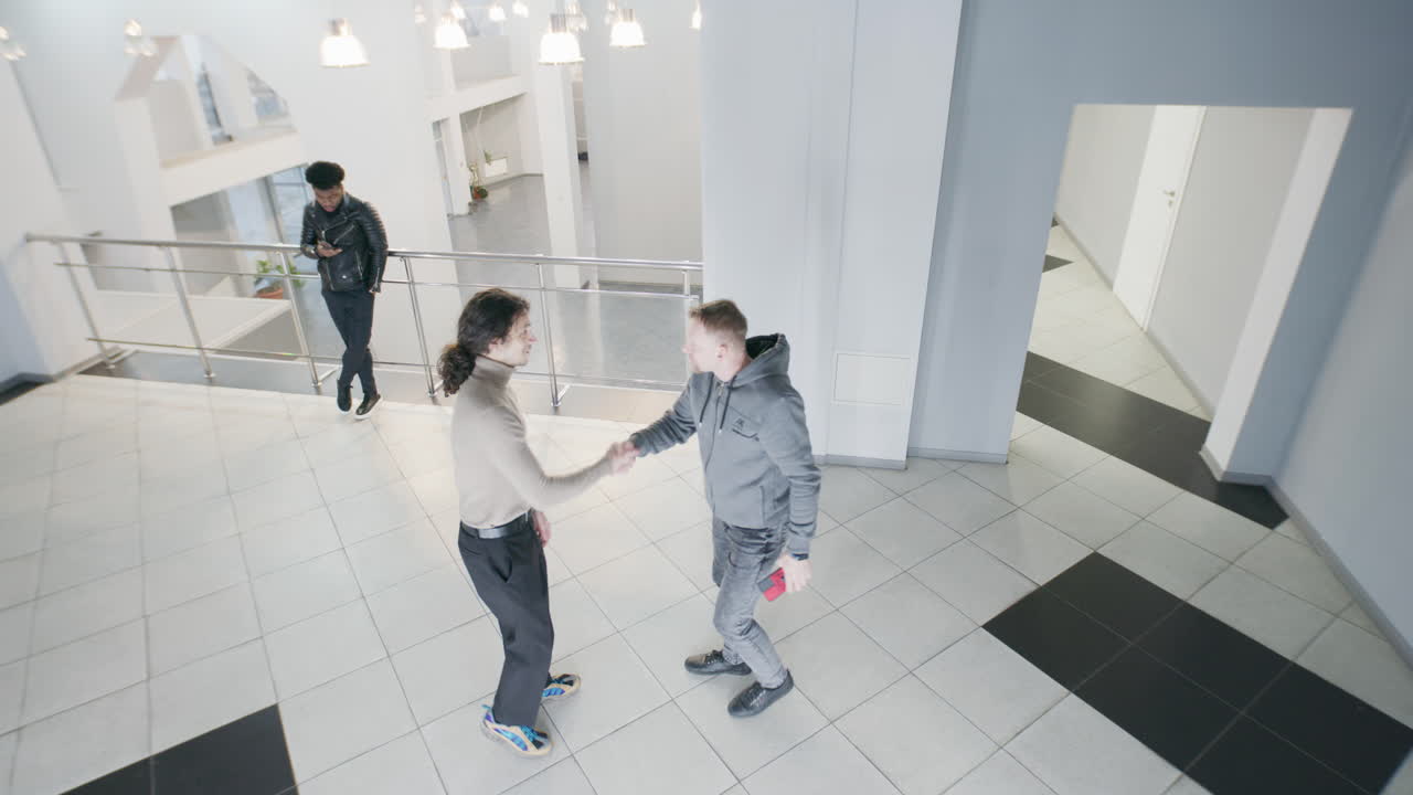 People in a Modern Office Building Lobby