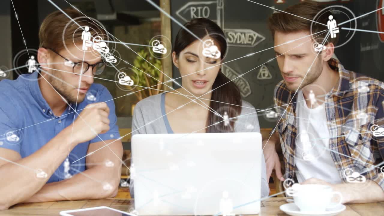 Three at cafe, woman typing on laptop, initiating network overlay with cloud icons for design