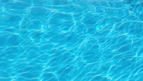 water drop in swimming pool. blue color. stop motion video. h2o hotel relax
