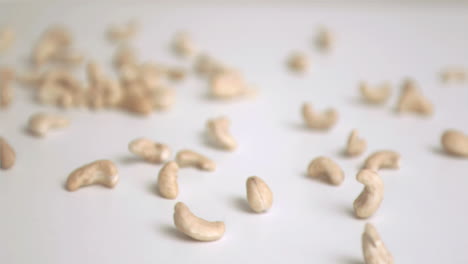 cashew nuts being poured in super slow motion