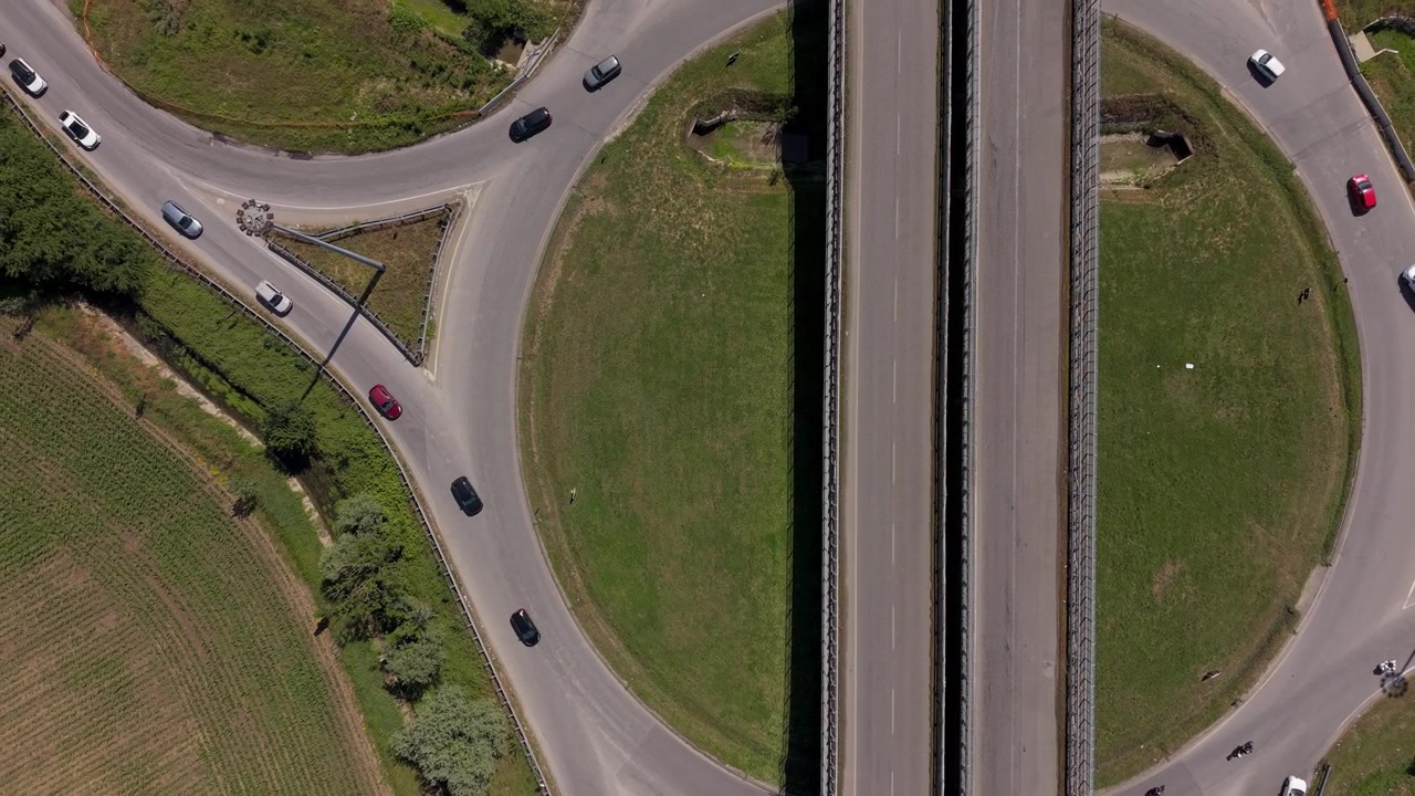 Roundabout Traffic Flow Aerial View Near Milan Suburb Italy