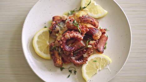 grilled octopus or squid with butter lemon sauce and thyme