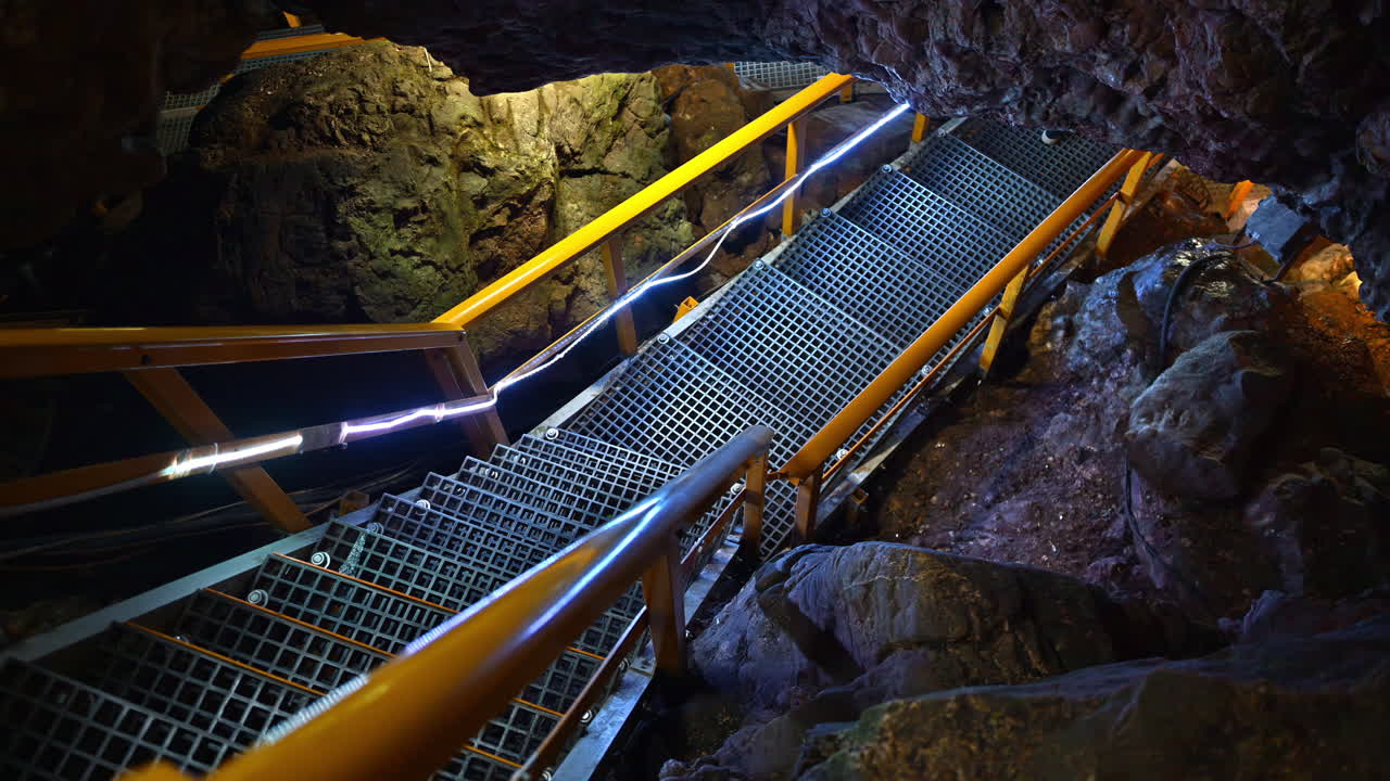 Stairs and rails inside of the Ialomita Cave in the Bucegi Mountains in Romania