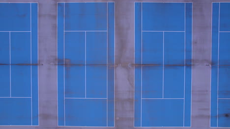 Overhead-view-of-tennis-courts-with-a-push-down-towards-the-courts