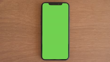 smartphone place on wood table,