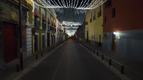 drone push in footage of the christmas lights and decorations in the streets of puebla, mexico