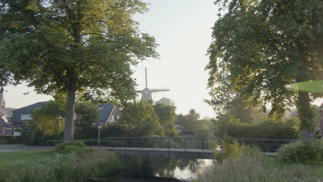 bycicle riding over a bridge in the morning