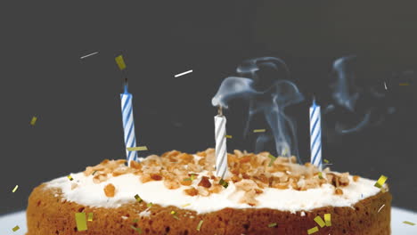animación de confeti de oro cayendo sobre el pastel de cumpleaños con velas