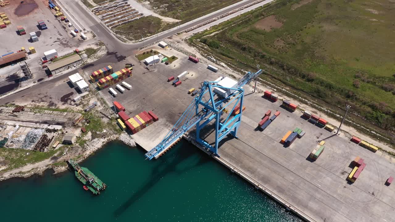Quayside Container Crane At The Seaport In Ploce, Croatia - aerial drone shot