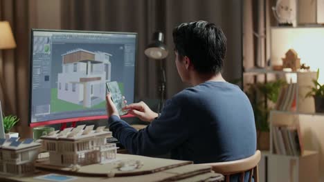 arquitecto trabajando en un proyecto de diseño de casa por la noche