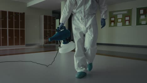 Tracking-video-of-disinfection-of-the-building-corridor