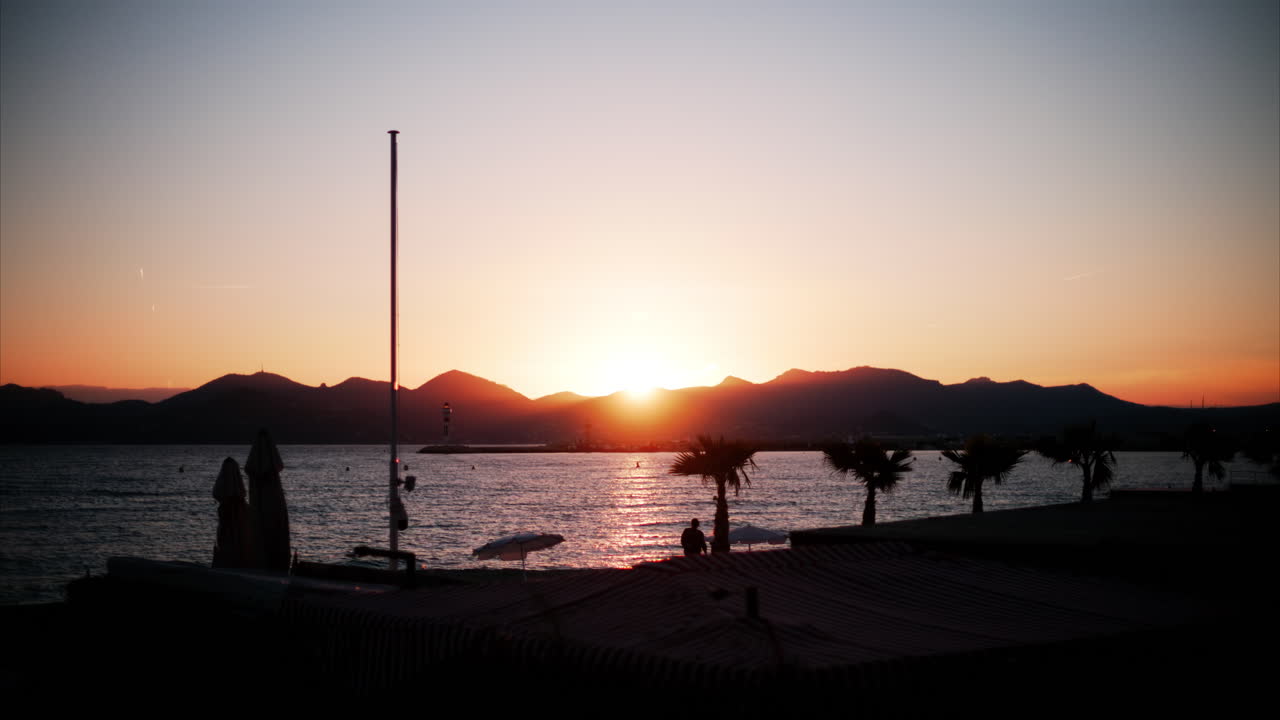 View of a beach in the French Riviera at sunset