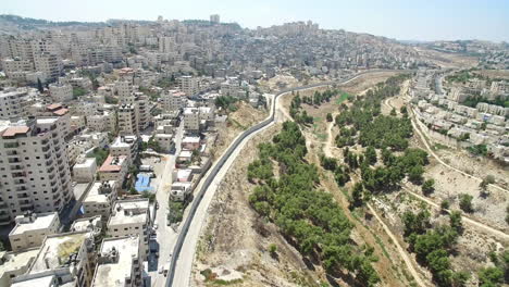 aerial view of urban landscape and separation barrier