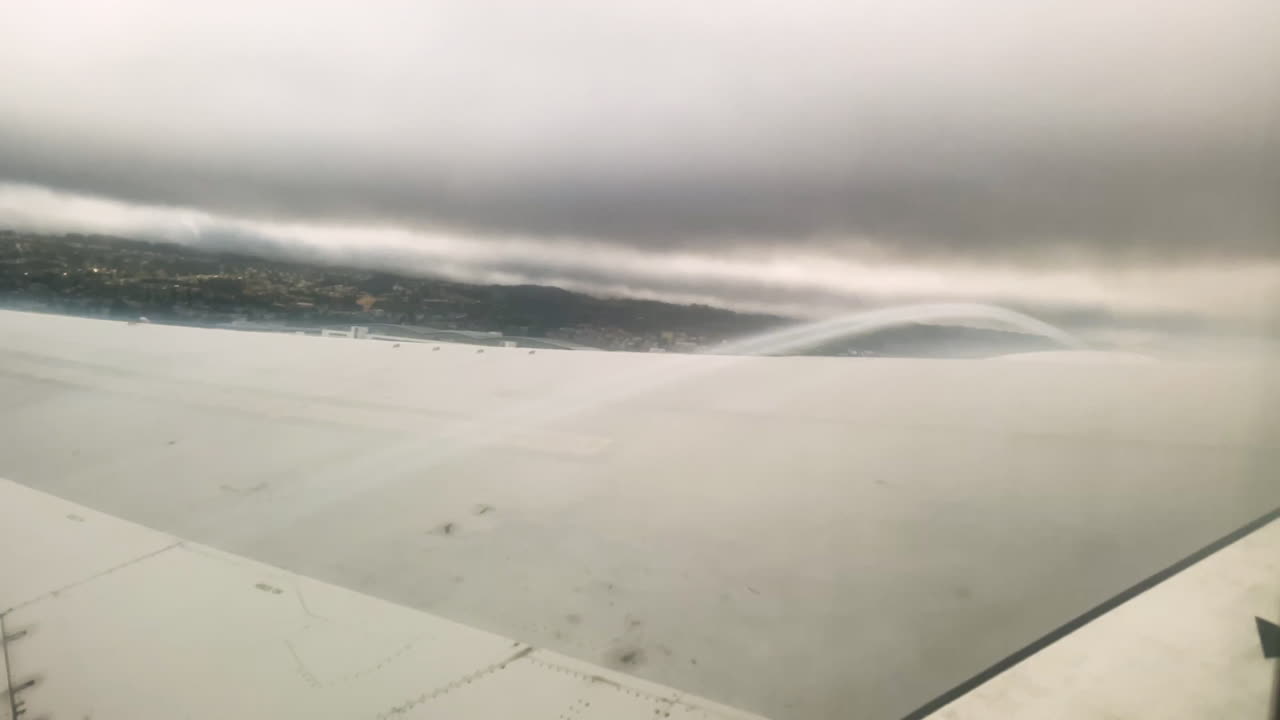 Airplane Window POV With Visible Airflow Over Wing On Take-Off